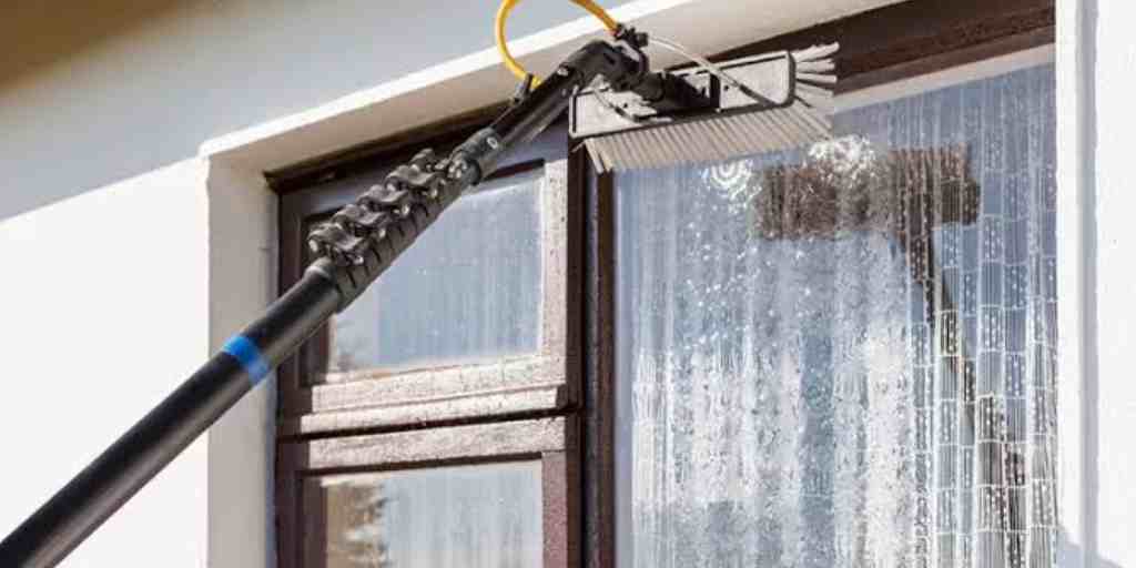 Before – window being cleaned with purified water-fed pole system